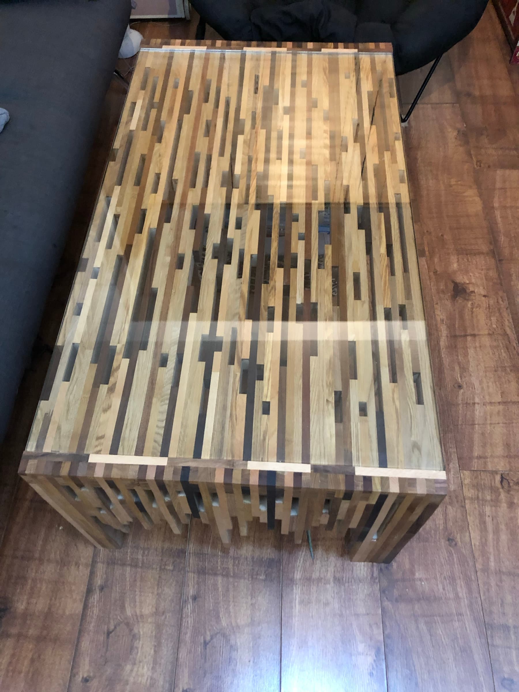 Finished dense end-grain block coffee table in a living room, wood floor