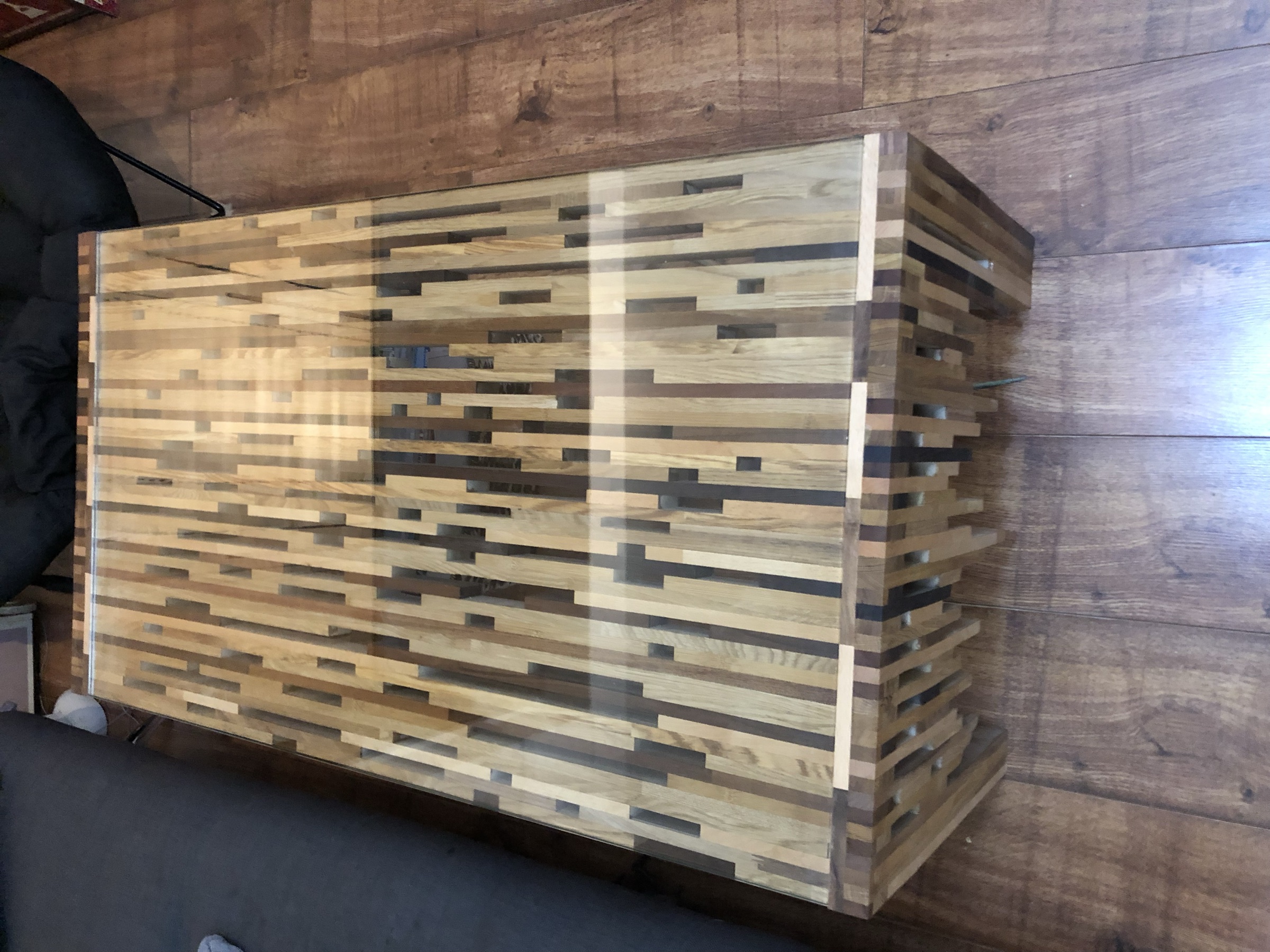 Finished dense end-grain block coffee table in a living room, wood floor